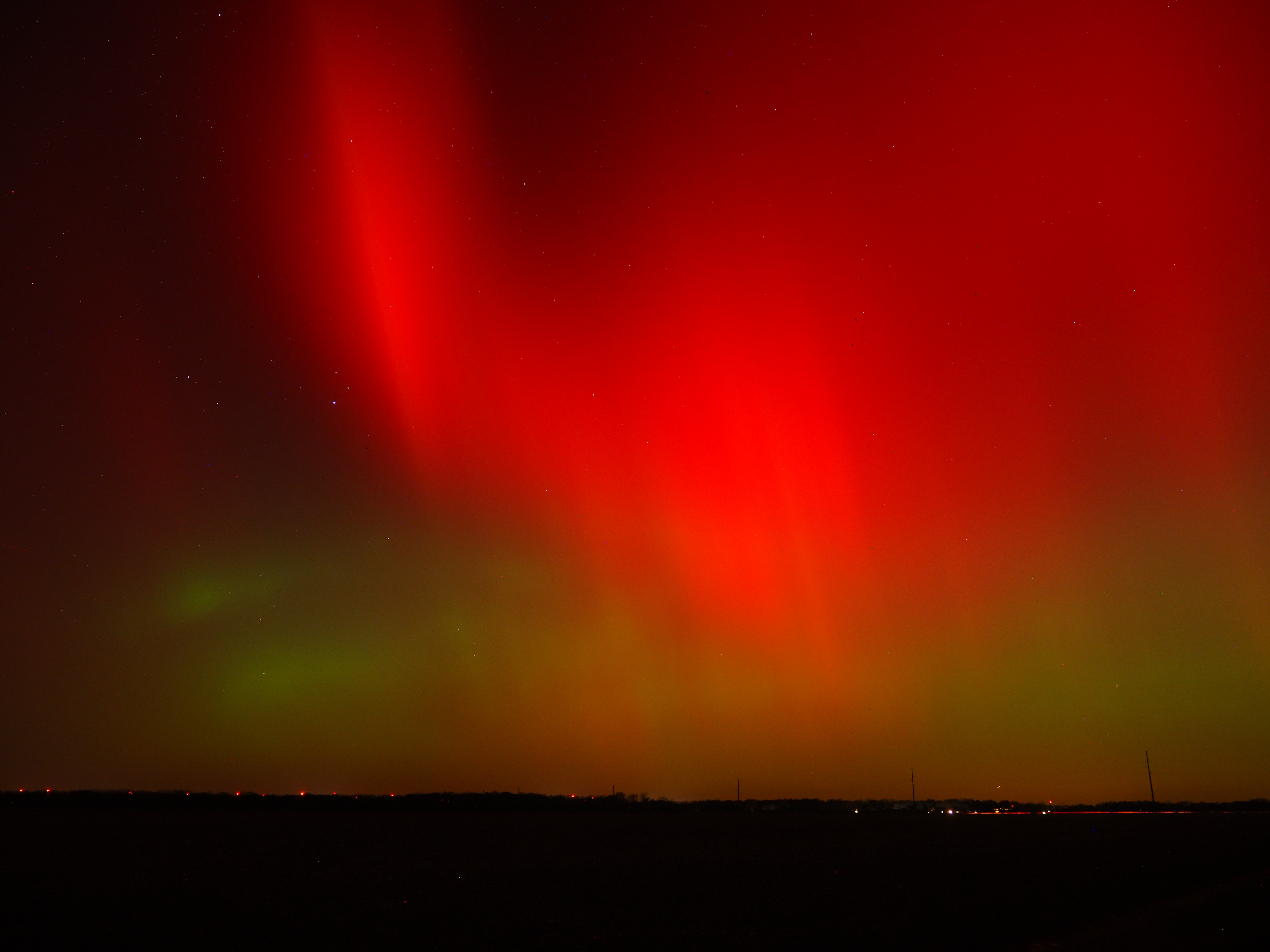 The northern lights over farmland
