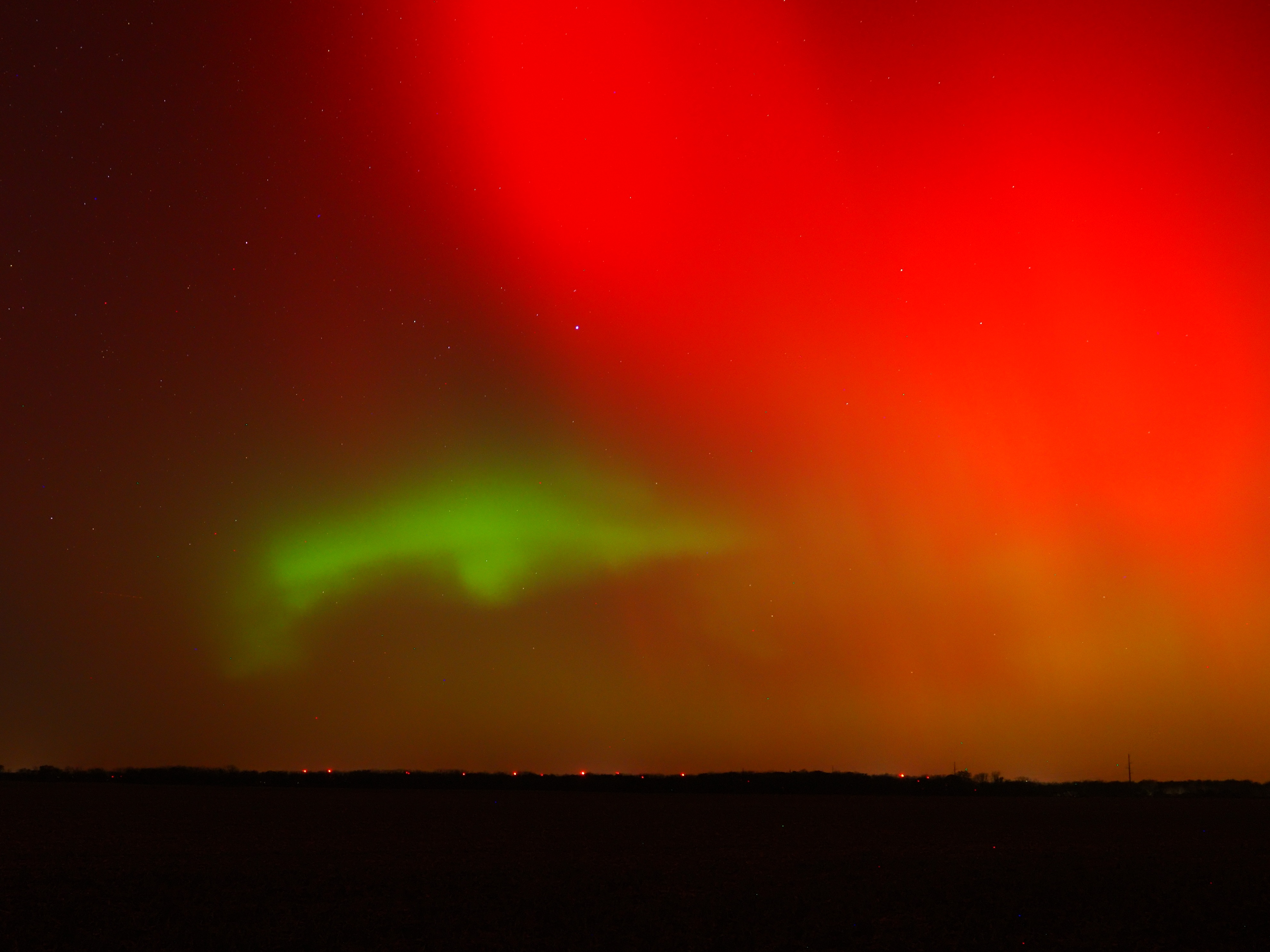 The northern lights over farmland