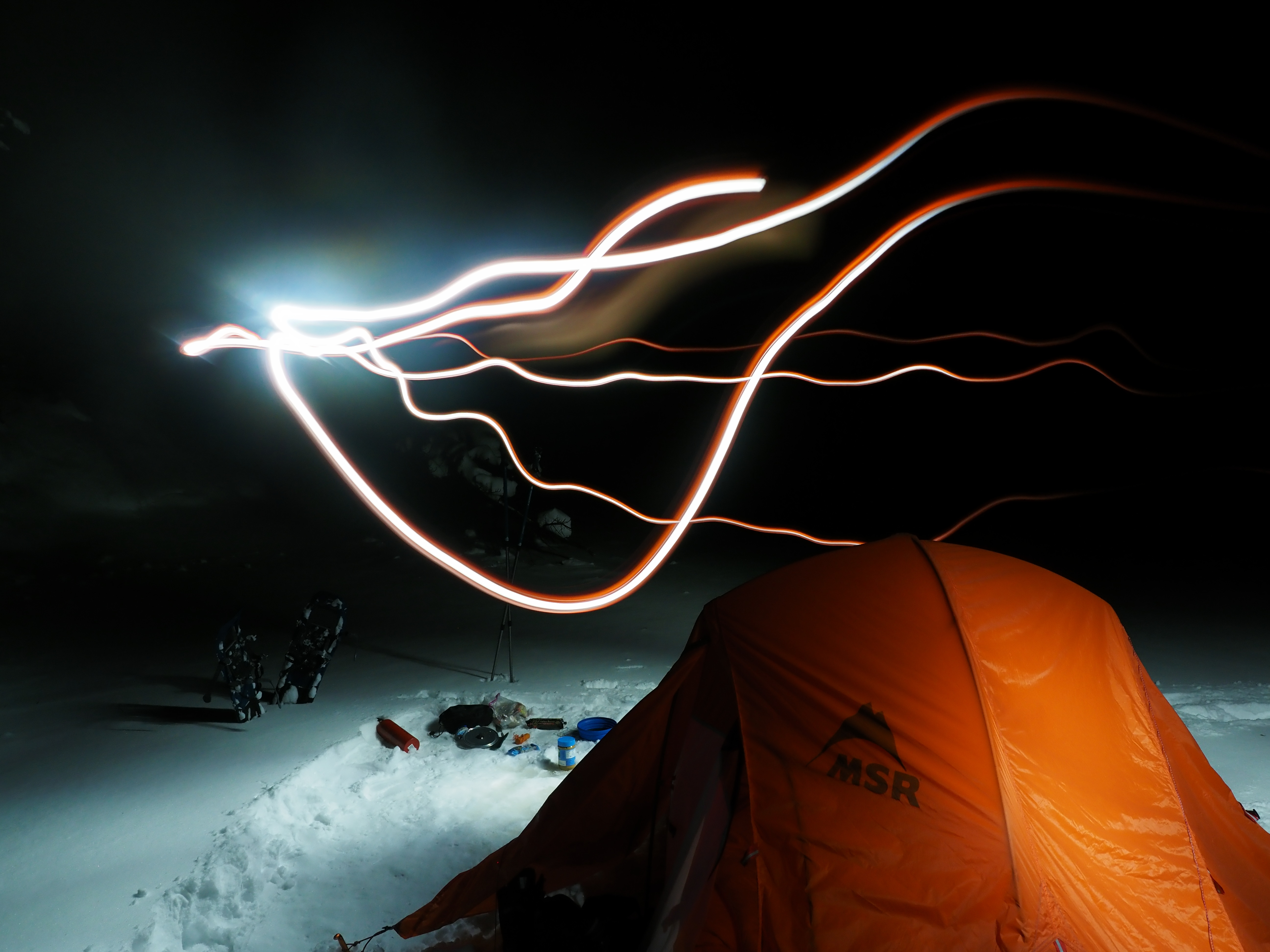 A photo of a tent with streaks of light