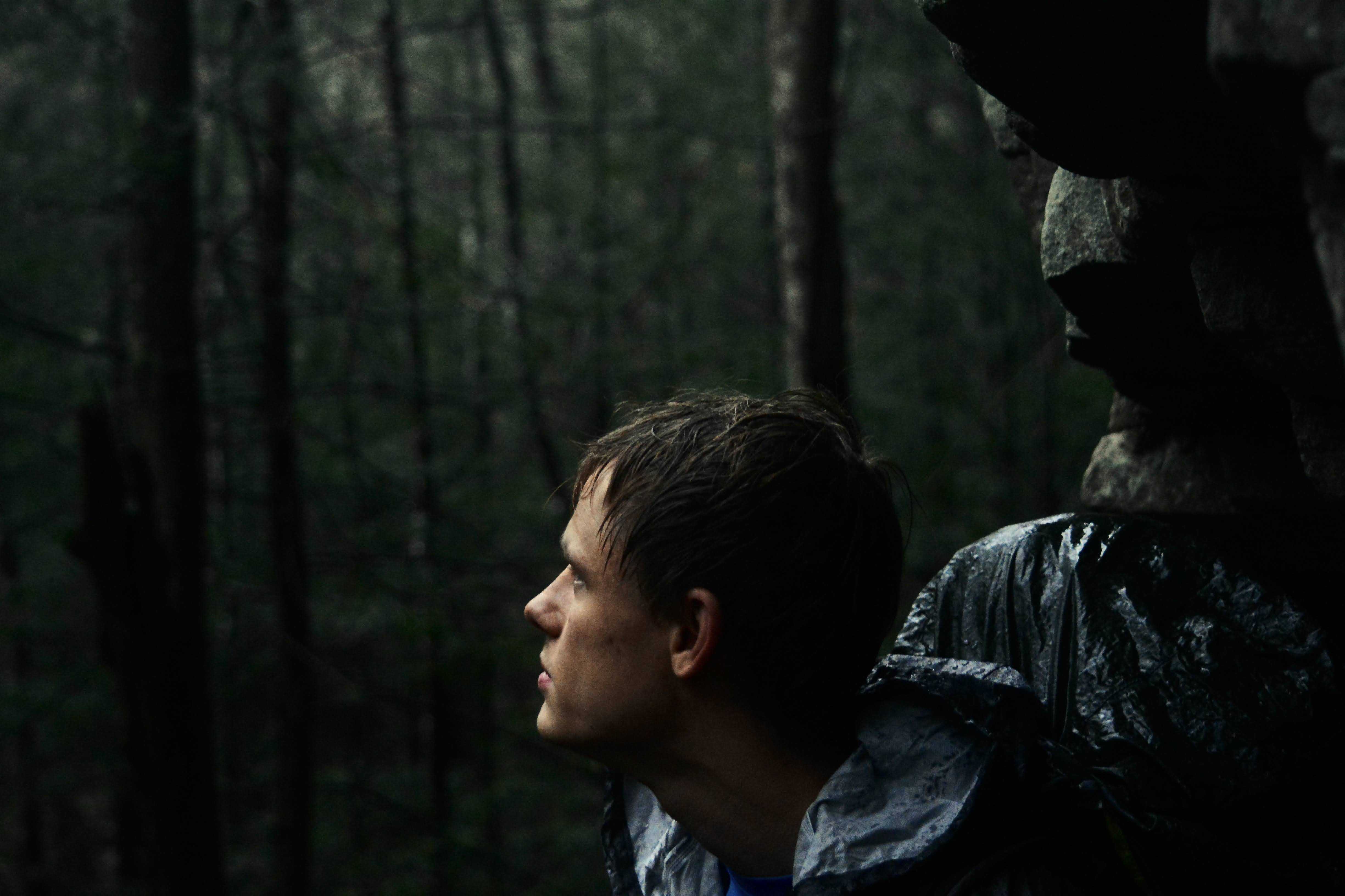 Image of a hiker in a forest